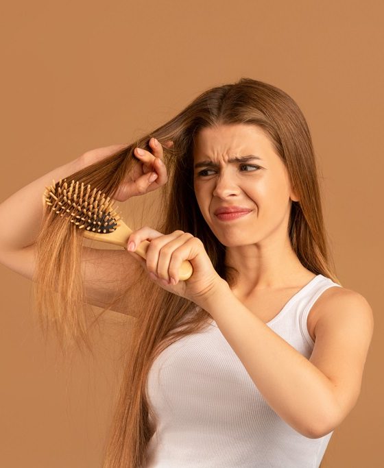 How many hair strands is normal to shed daily?